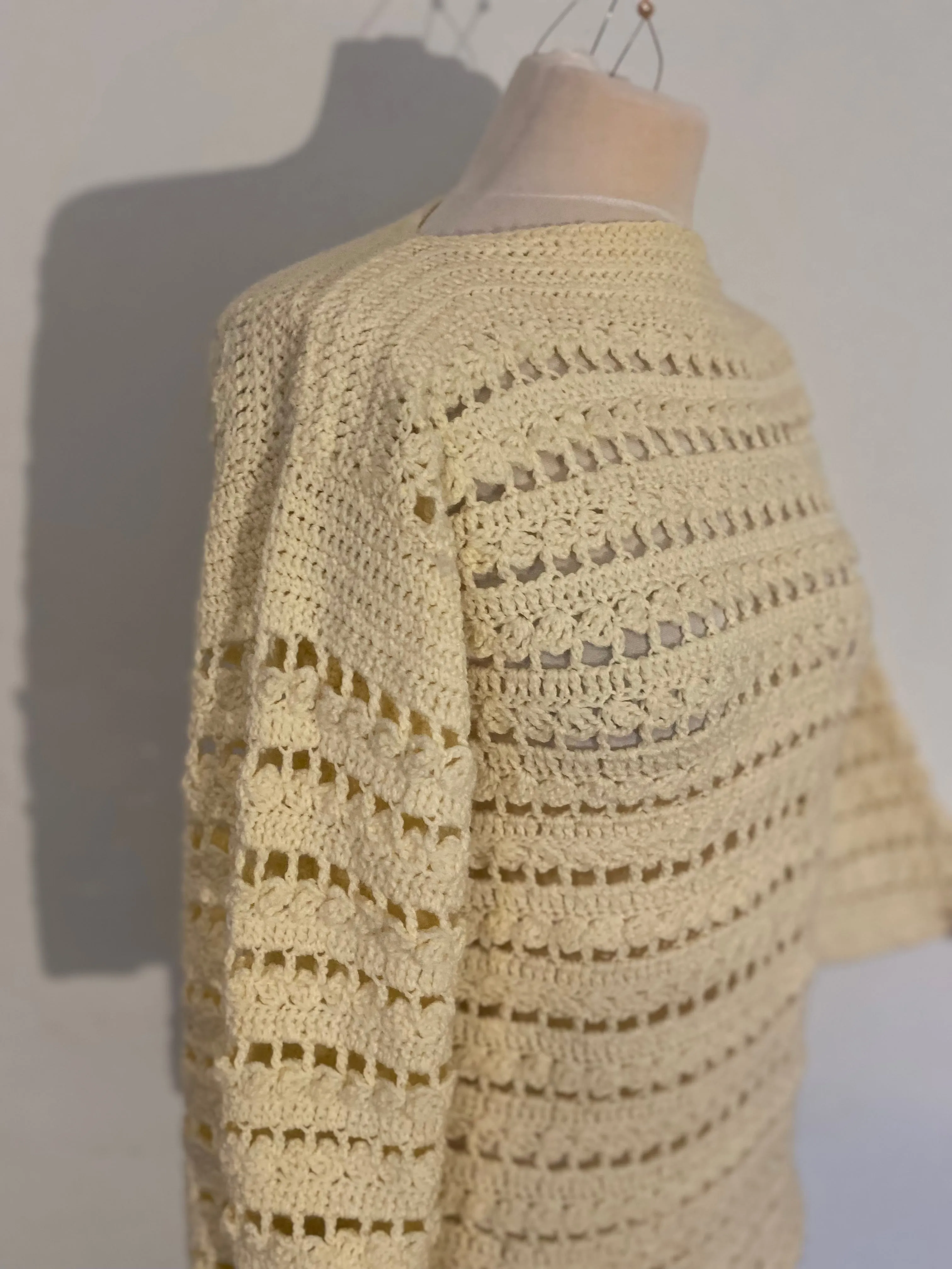 Cream crochet bell sleeve top